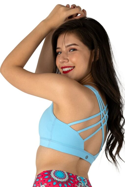 Criss-Cross Sports Bra in Sky color showing the side view