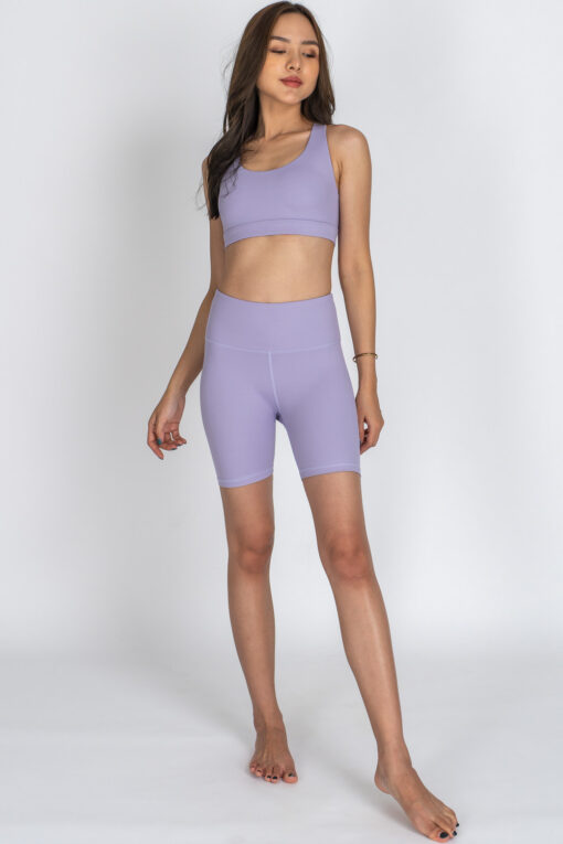 Front view of Pastel Purple Fitness Shorts with matching purple top